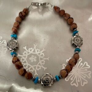 Beautiful 8” sterling silver, brown beads, and turquoise nugget bracelet